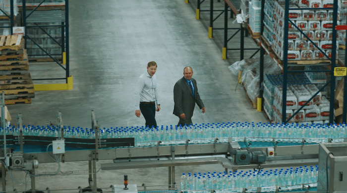 Walking the production line with The Alkaline Water Company's President and CEO Mr. Richard Wright