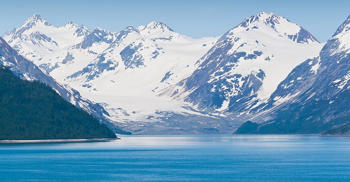 Alaskan mountain range above lake