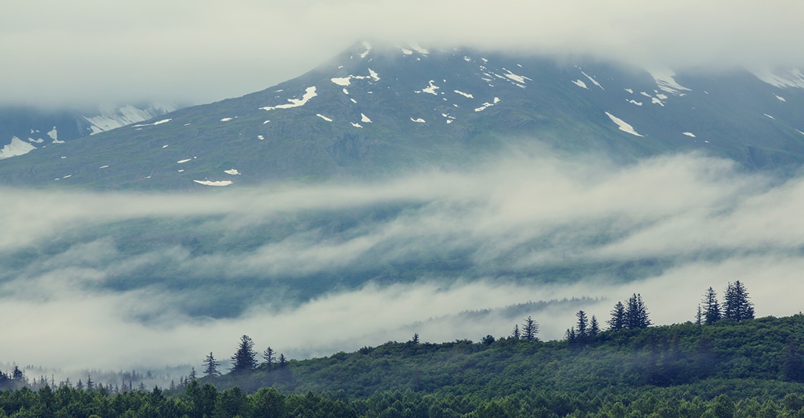 Alaskan mountains in the clouds
