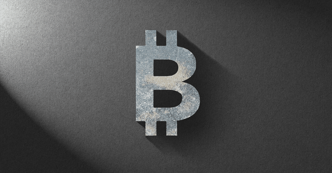bitcoin symbol on grey background