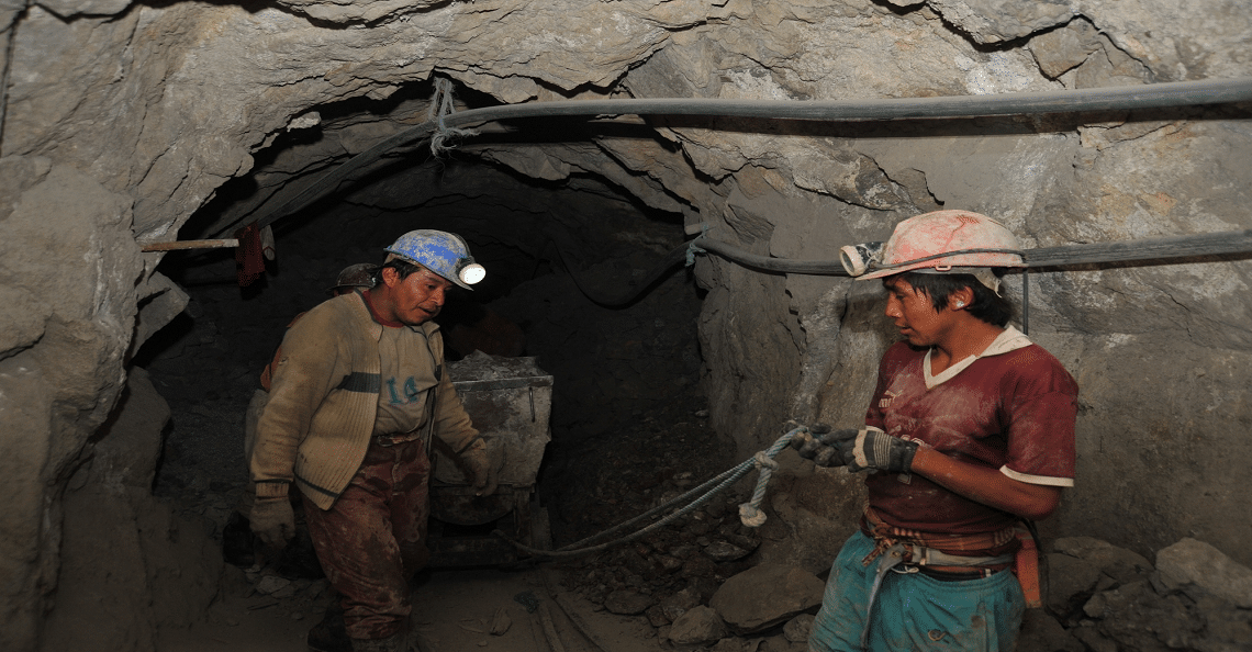artisanal miners work underground